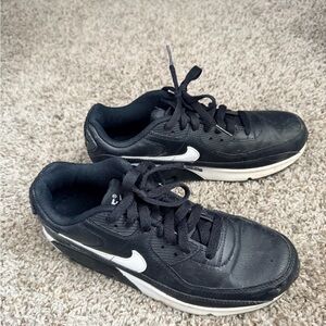 Nike Black Sneakers with White Swoosh